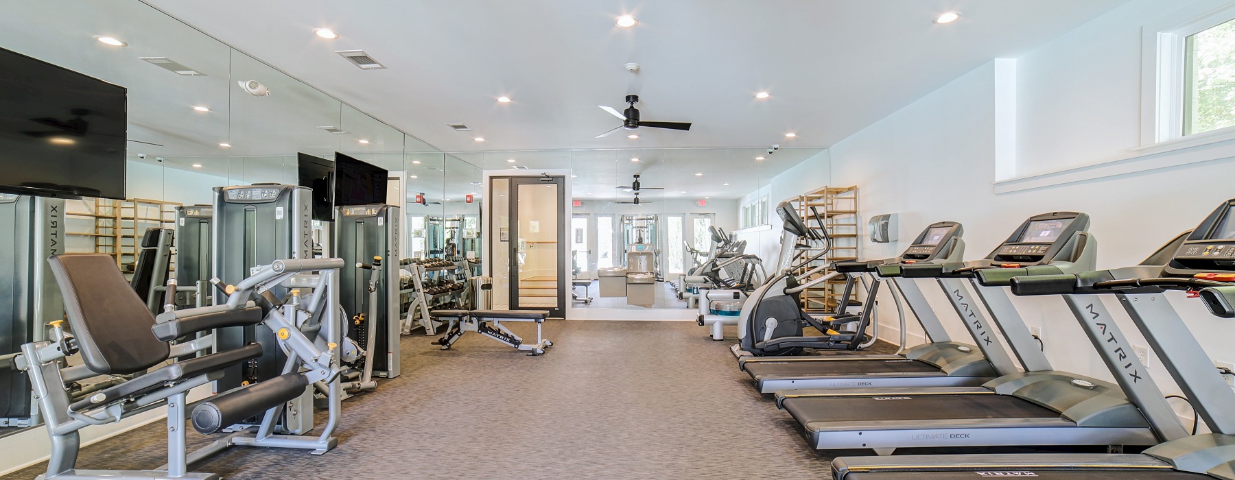 fitness room with workout equipment